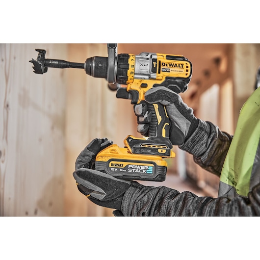Powerstack battery being connected to a 18V XR Brushless drill driver