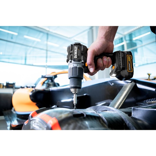 Limited Editon DEWALT/McLaren Drill Driver being used by mechanic on a McLaren car chassis