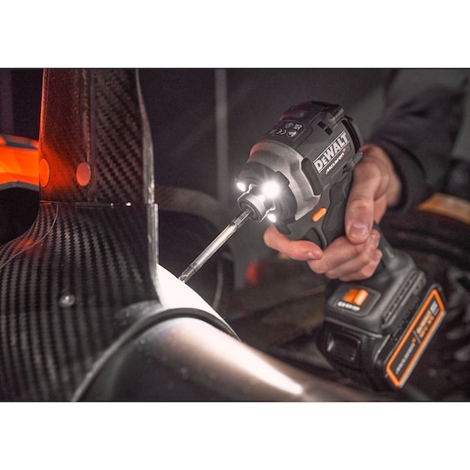 DEWALT/McLaren drill driver being used with working light on