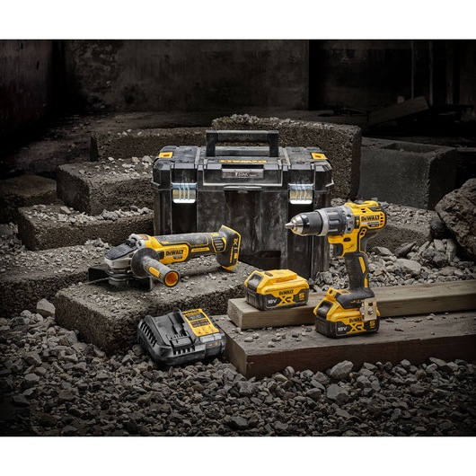 Kit including DCD796 Combi Drill, DCG405 Angle Grinder, 2 x DCB184 5.0Ah batteries, DCB1104 Charger and TSTAK Case