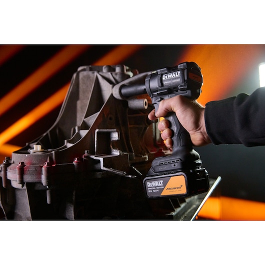 DEWALT x McLaren F1 Team 18V XR Special Edition Impact Driver with 5Ah battery in application