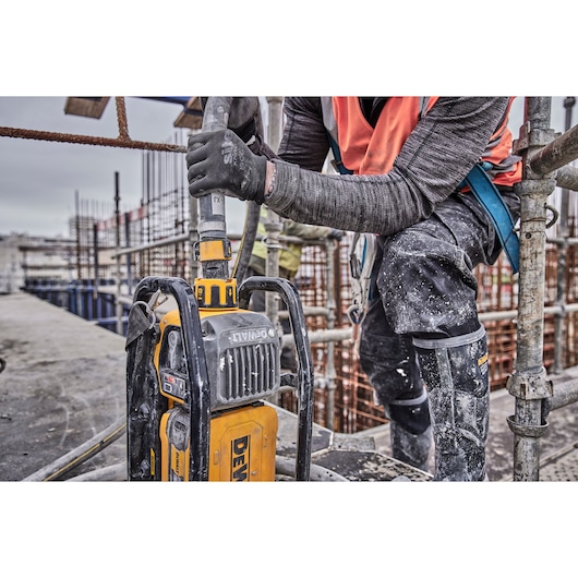 Hose being fitted to Powershift Powerpack Concrete Vibrator 