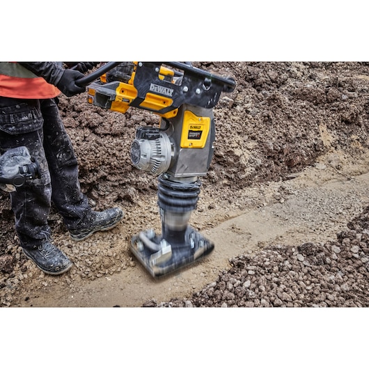 Powershift Rammer vibrating as it compacts ground on construction site
