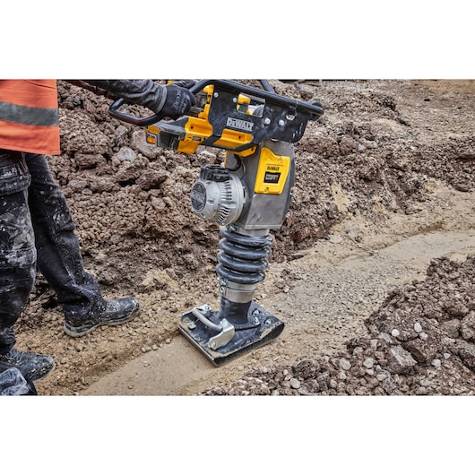 Powershift Rammer compacting ground on construction site