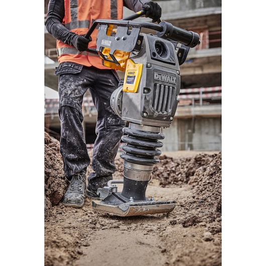 Powershift Rammer compacting ground on construction site