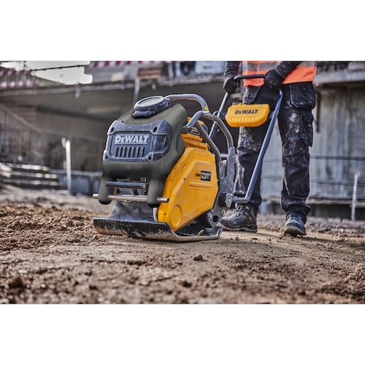 Close view of Powershift Plate Compactor compressing the ground on a construction site