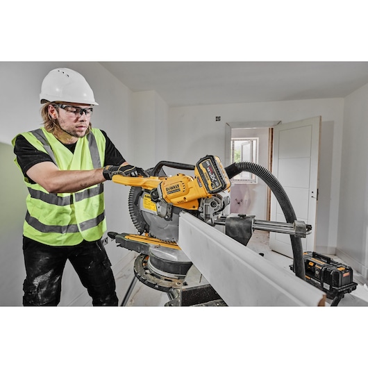 54v XR FLEXVOLT 305mm Mitre Saw right side view cutting skirting board