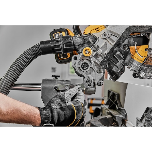 54v XR FLEXVOLT 305mm Mitre Saw close up of head lock and dust extraction
