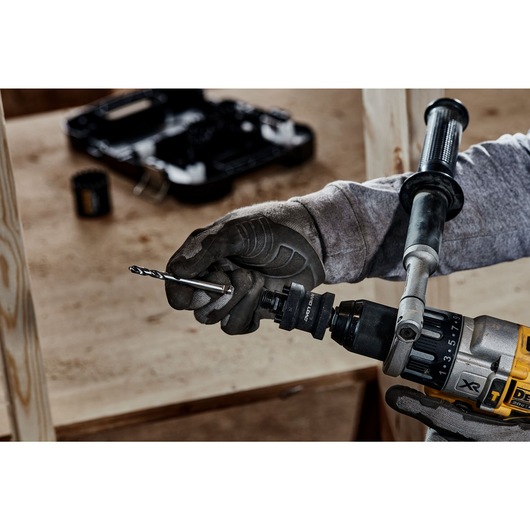 Person holding 2L Quick Change Hole Saw Arbour