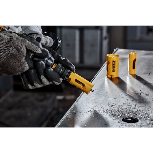 Person holding 5L Quick Change Hole Saw Arbour