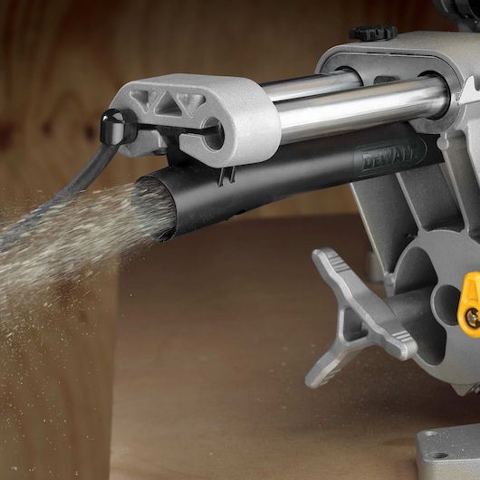 Close up of dust collection system feature of double bevel sliding compound miter saw.