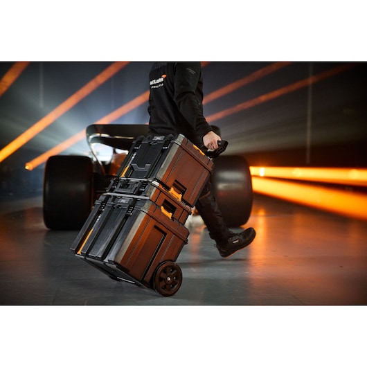 Stacked rolling storage cases with handle, suitable for photography gear transport, ensures portability.