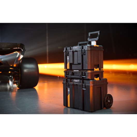 Stanley rolling tool cases stacked for portable storage and organization.