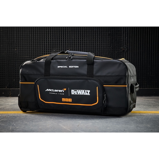 McLaren DEWALT special edition black sports bag with orange accents for tool or gear storage.