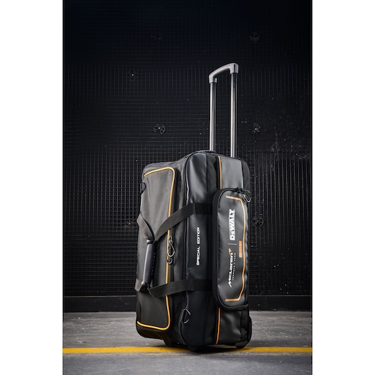 DEWALT rolling duffel bag with telescoping handle for tool transport and storage.