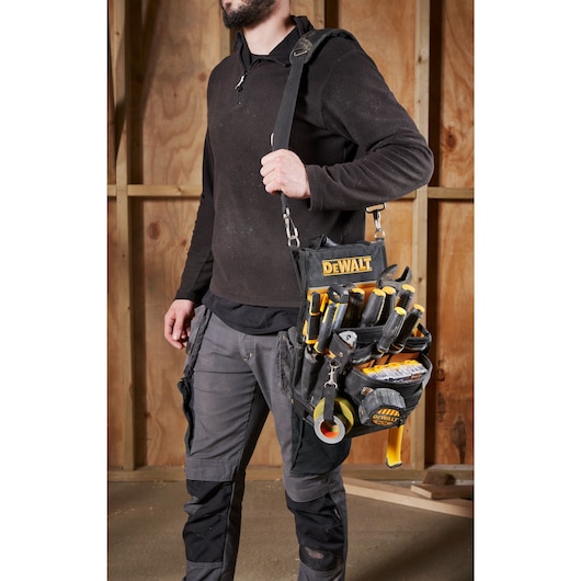 soft tool organizer and model with the bag on the right shoulder 