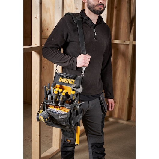 soft tool organizer and model with the bag on the left shoulder 