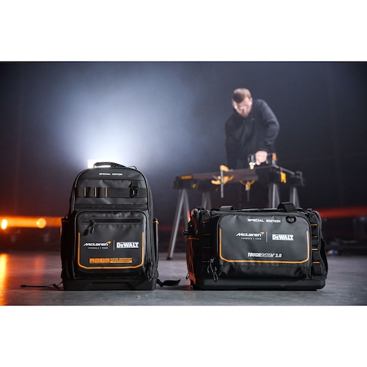 DEWALT McLaren tool backpack and duffel bag, water resistant, for carrying tools on job sites.