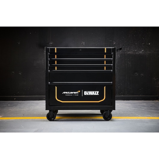DEWALT McLaren rolling tool chest with multiple drawers for workshop tool organization.